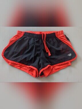 New Balance Lightning Dry Women's Lined Drawstring Waist Shorts. Size XSmall.